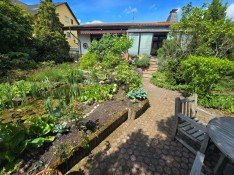 Hauptbild Ein Haus voller Möglichkeiten: Großzügiges Wohnen mit Galerie, Kamin und Traumgarten!